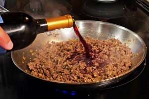 Add The Wine To The Pan