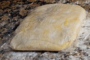 Rest The Dough Wrapped in Plastic